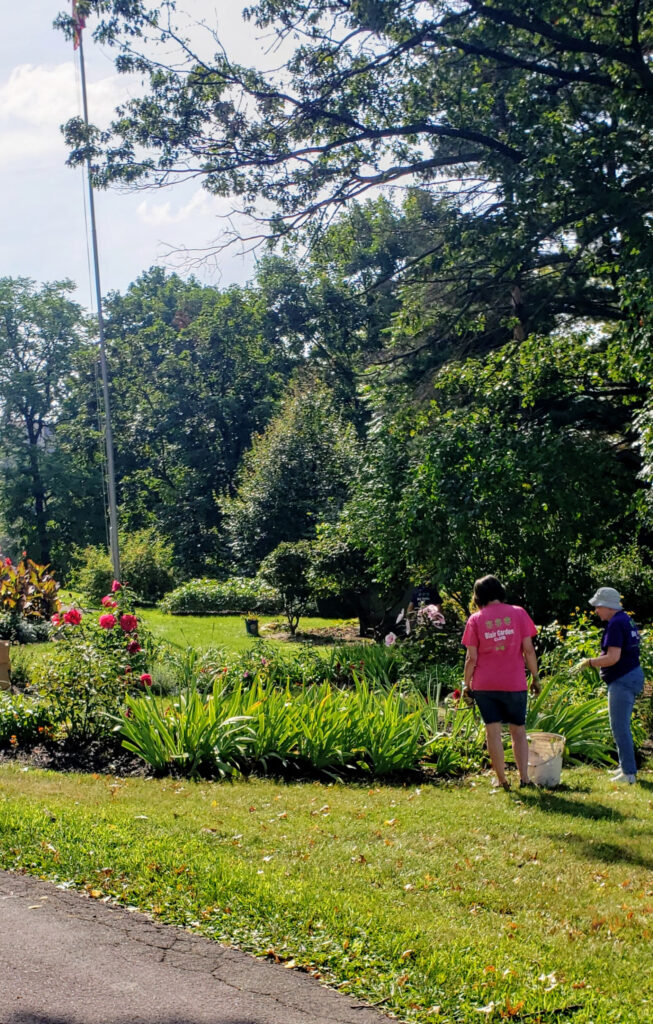 The mansion boasts beautiful gardens.